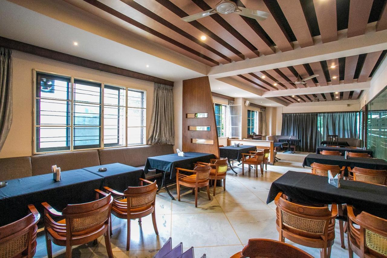 Hotel Oyo 18762 Vaishnavi Residency à Bangalore Extérieur photo